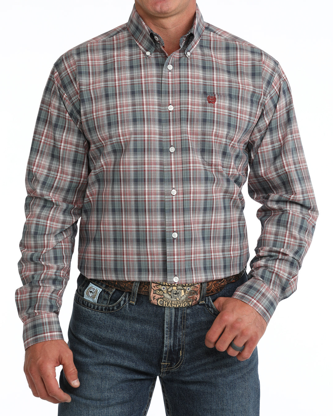 Person wearing a plaid Cinch shirt and jeans on a white background
