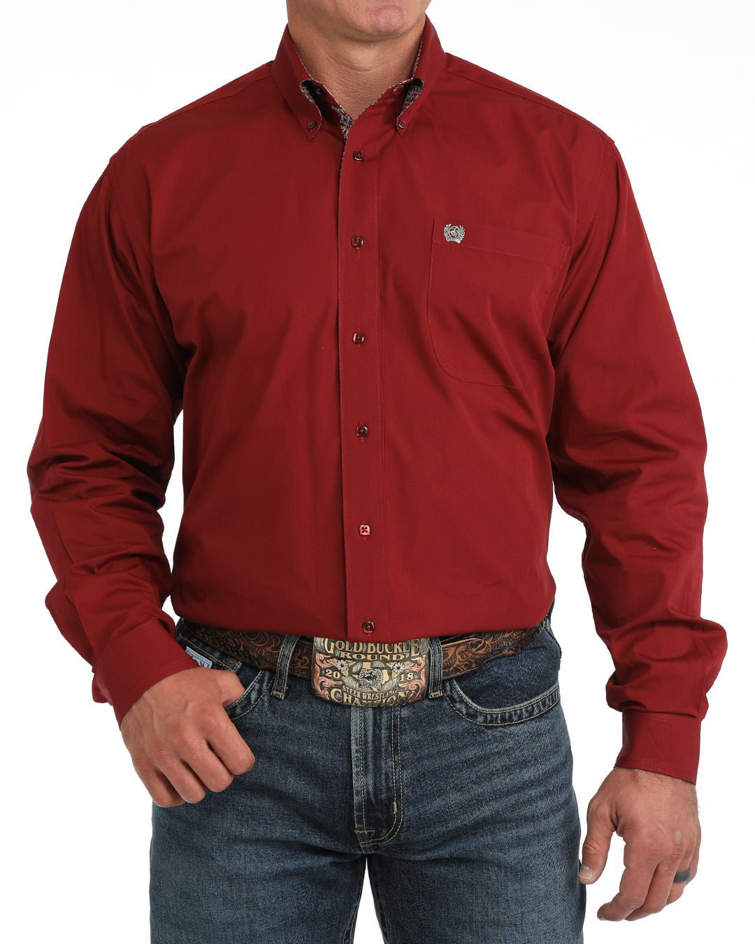 Red button-up Cinch shirt worn by a person on a white background