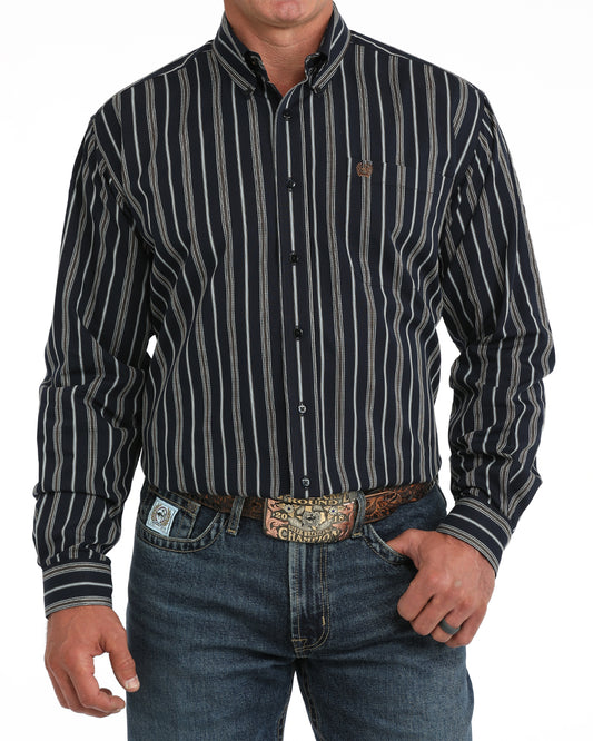 man wearing a navy stripe Cinch shirtand blue jeans on a white background