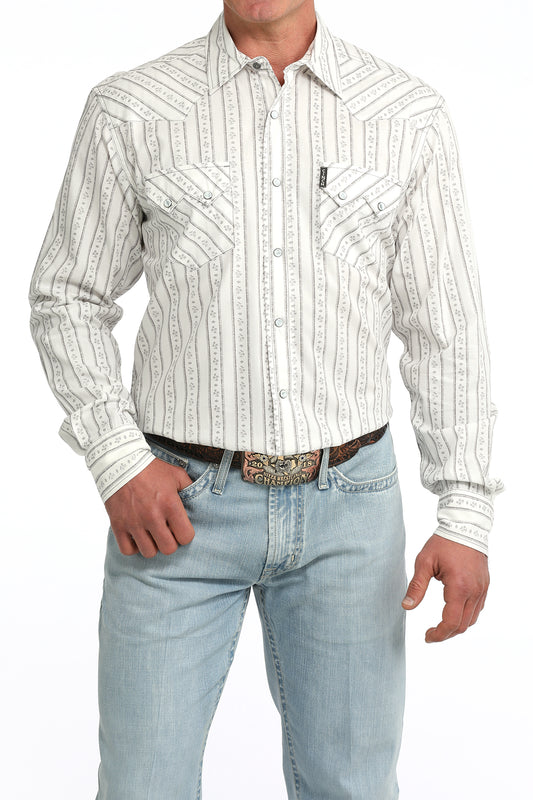 Man wearing a white striped Cinch shirt and light blue jeans on a white background