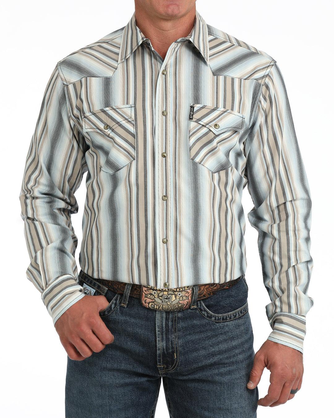Man wearing a blue striped Cinch shirt and blue jeans on  a white background