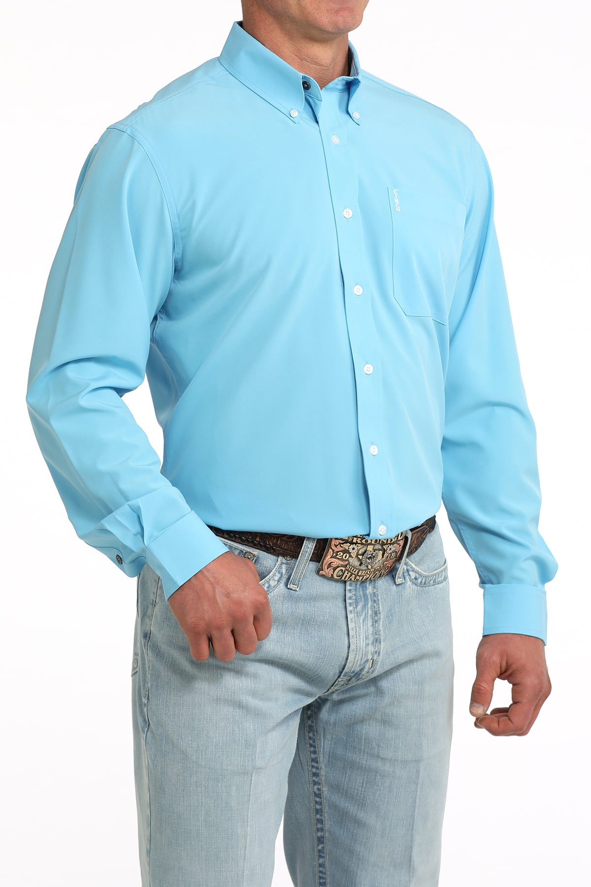 man wearing a blue Cinch shirt and blue jeans on a white background