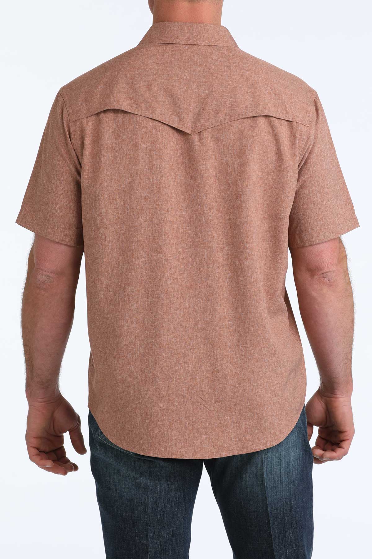 Brown short-sleeve 'Cinch' shirt worn by a person on a white background