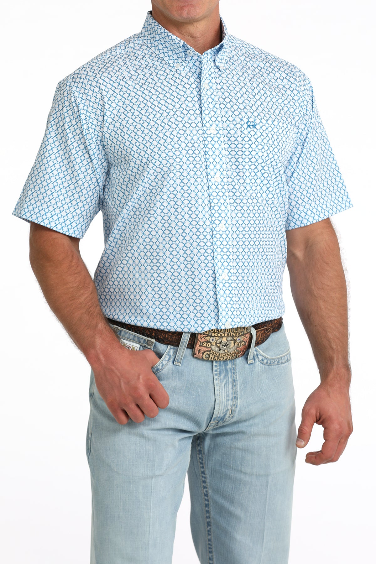 man wearing a blue printed shirt and blue jeans on a white background
