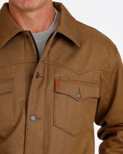 Man wearing a brown Cinch jacket on a white background