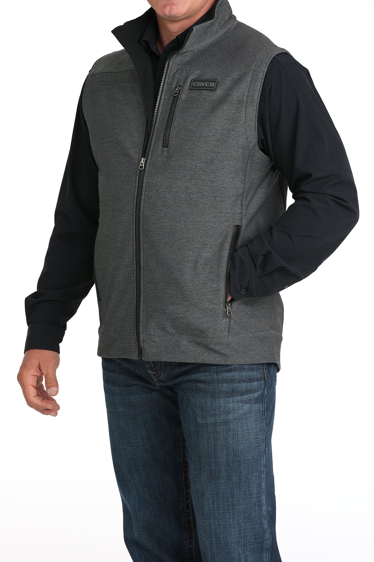 Man wearing Cinch vest on a white background