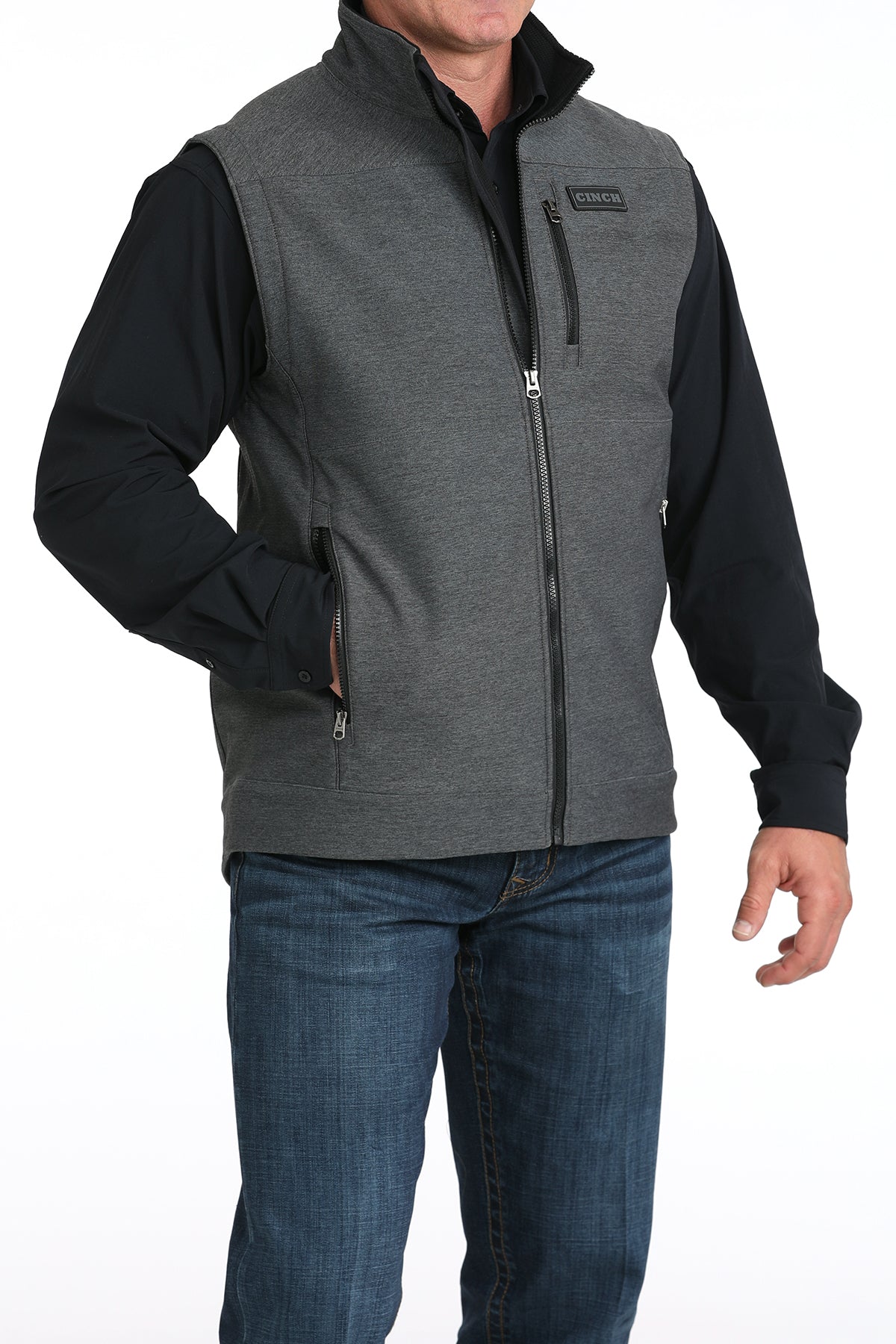 Man wearing Cinch vest on a white background