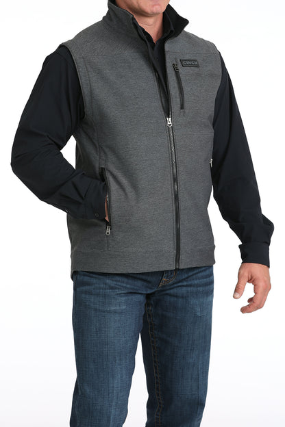 Man wearing Cinch vest on a white background