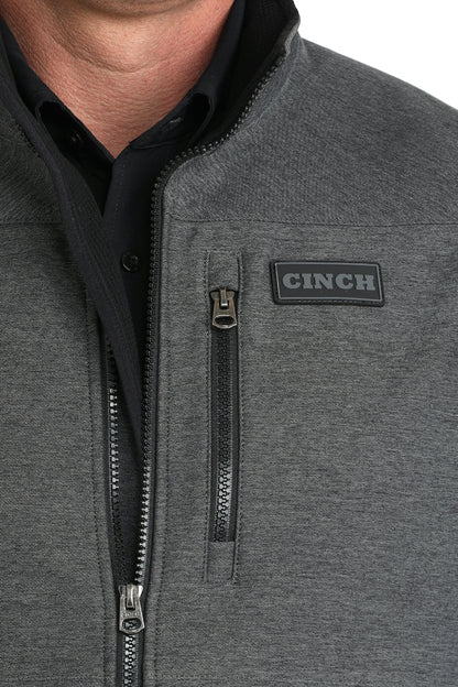 Man wearing Cinch vest on a white background