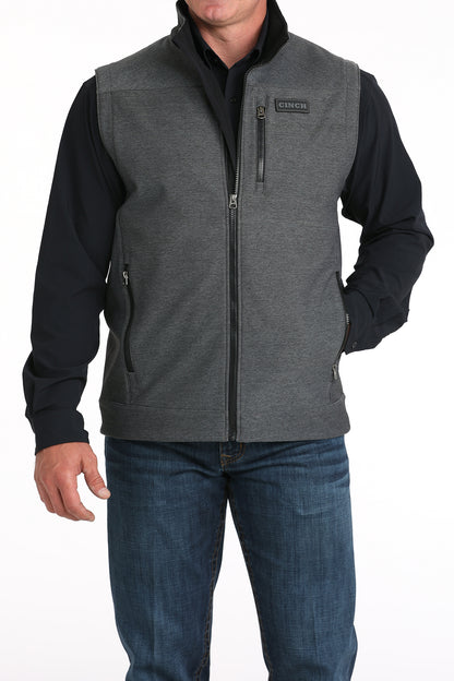 Man wearing Cinch vest on a white background