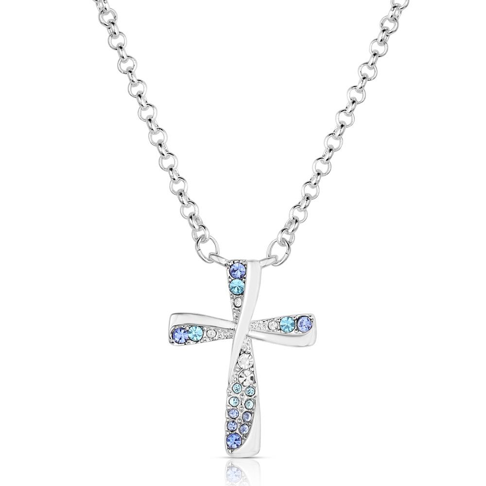 Montana Silversmiths Silver cross necklace with blue gemstones on a white background