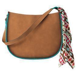 a brown shoulder bag with teal lace and a colorful scarf tied on
