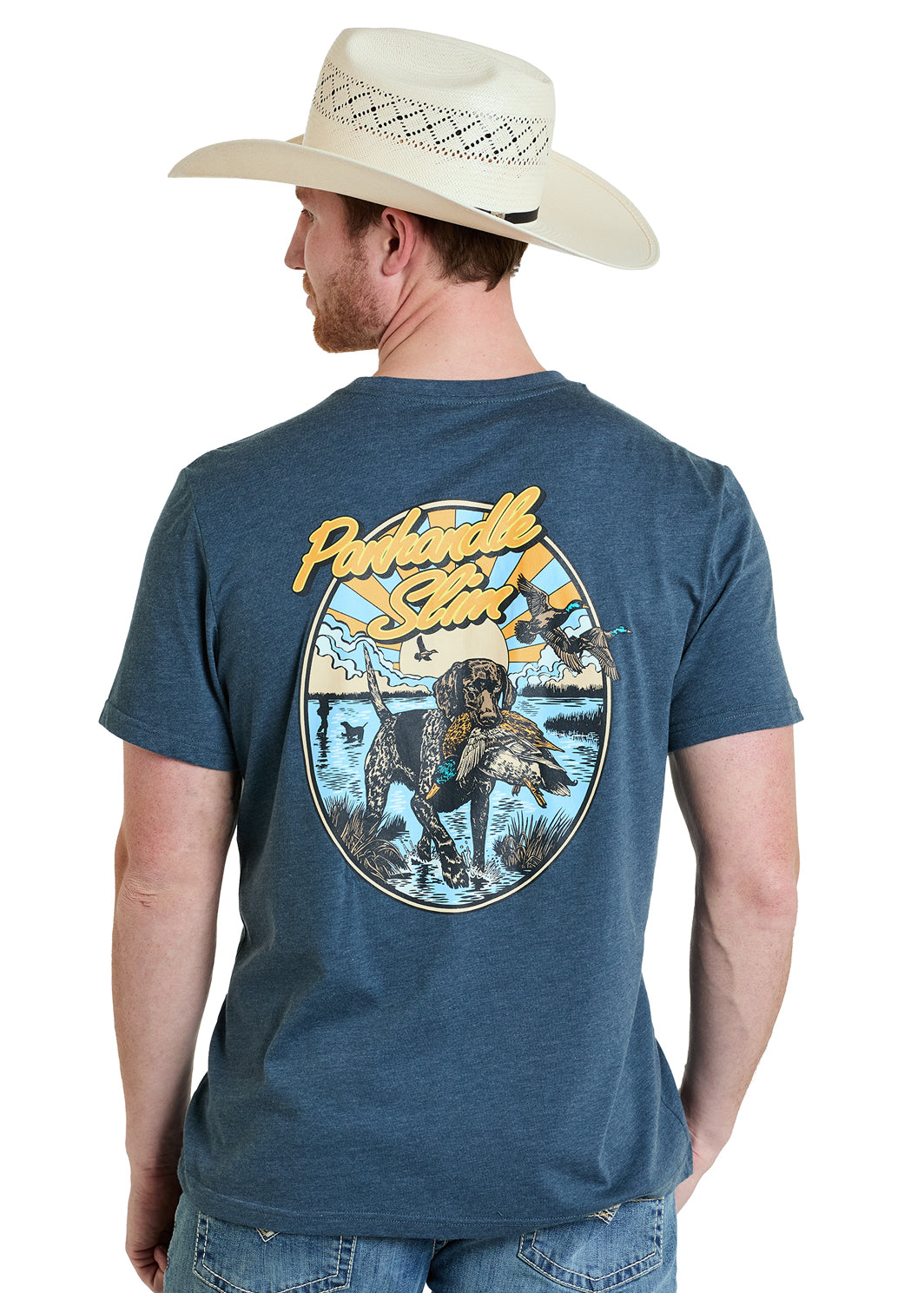 man wearing a Panhandle Slim tshirt with logo and art work, cowboy hat and jeans on a white background