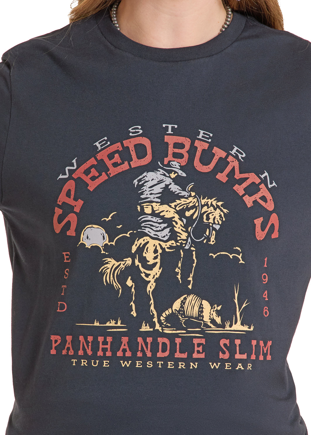 Black Panhandle Slim t-shirt with 'Speed Bumps Panhandle Slim' graphic design on a white background