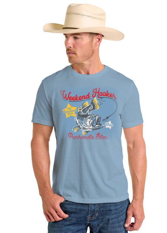 Man wearing a blue t-shirt with a graphic design and cowboy hat on a white background