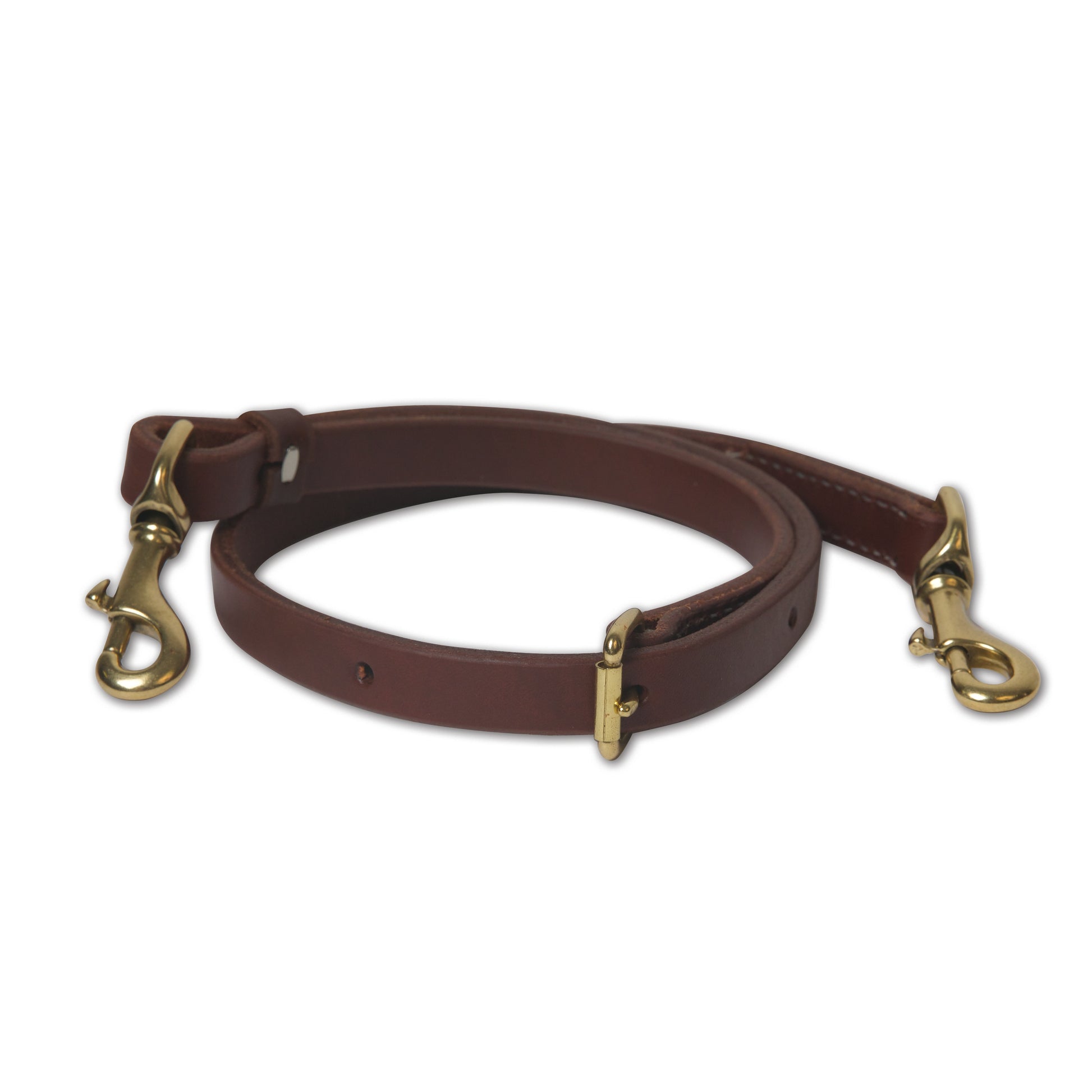 a heavy oiled harness leather strap with a brass buckle and two brass snaps