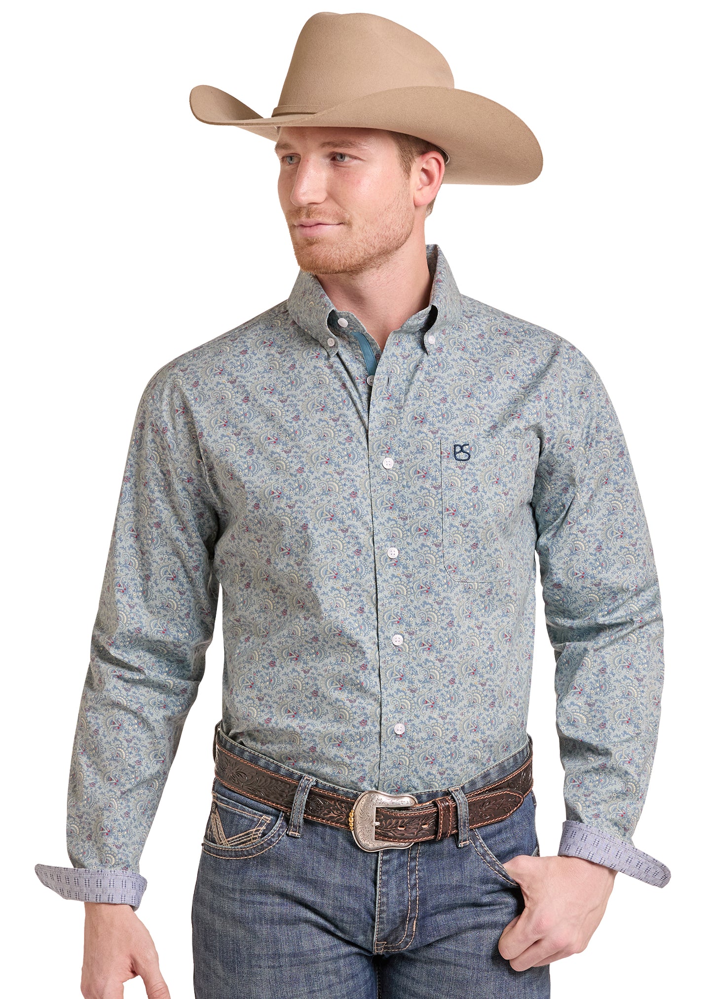 Man wearing a blue Panhandle Slim Shirt and blue jeans and a cowboy hat on a white background