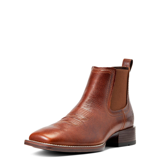 Brown leather Chelsea boot with a wide square cowboy toe on a white background