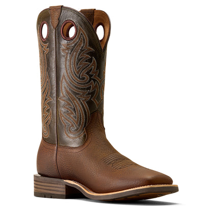 Brown Ariat cowboy boot with intricate stitching on a white background