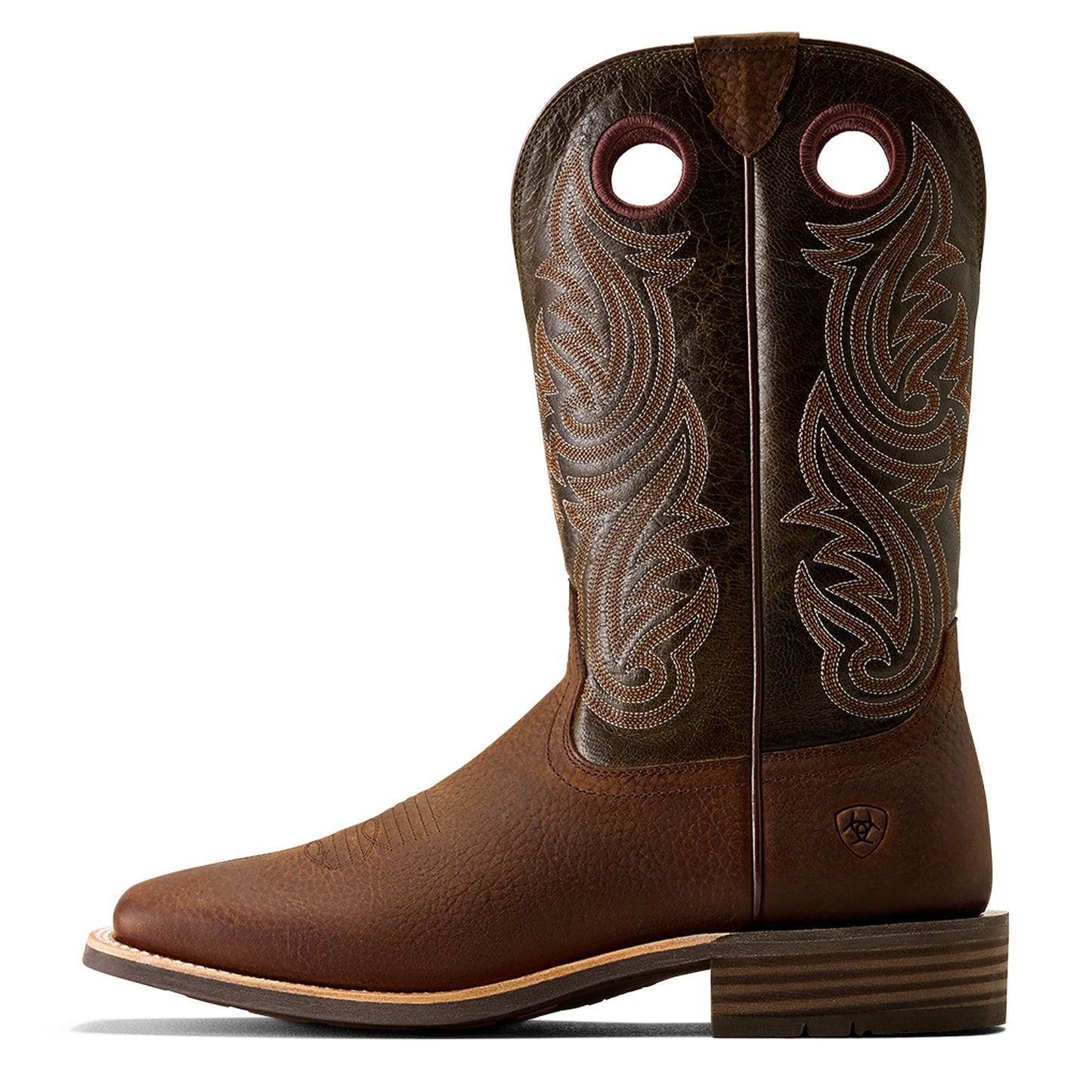 Brown Ariat cowboy boot with intricate leatherwork on a white background