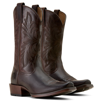 Pair of brown ariat cowboy boots with intricate designs on a white background