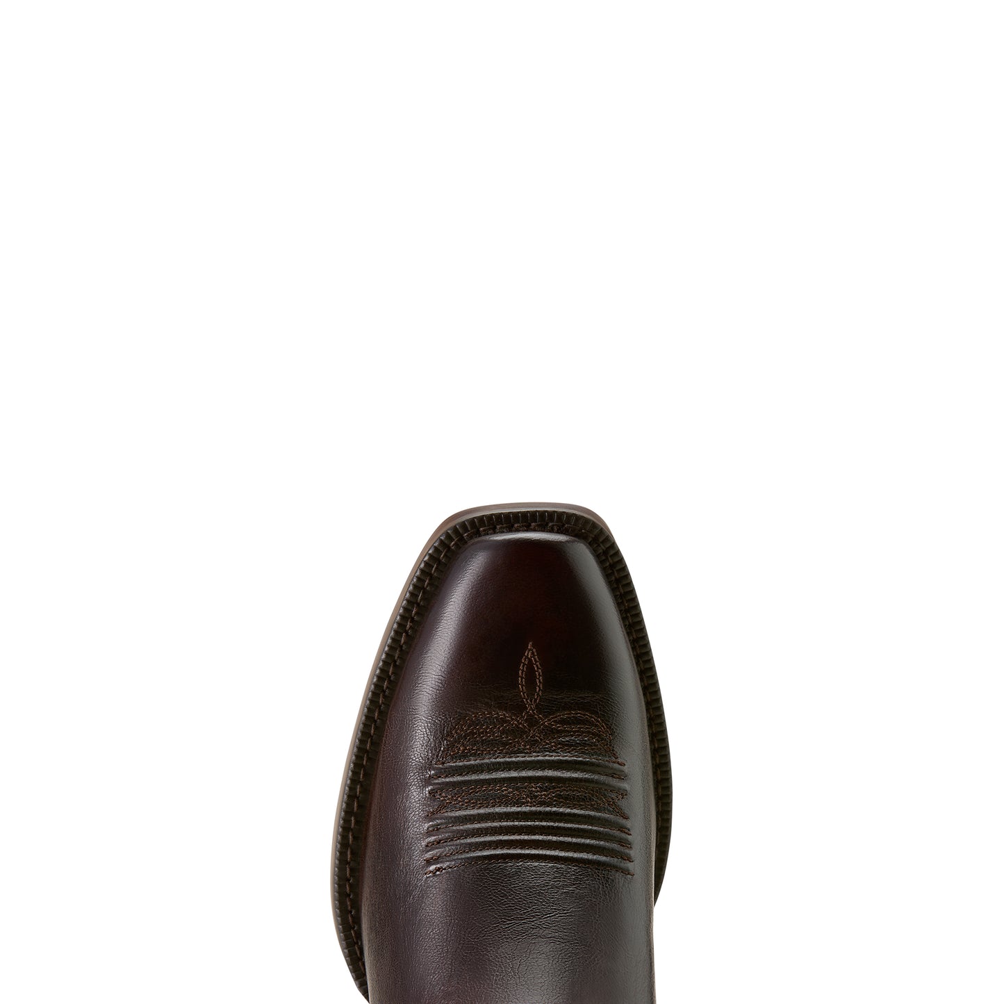 Close-up of a brown leather ariat boot toe on a white background