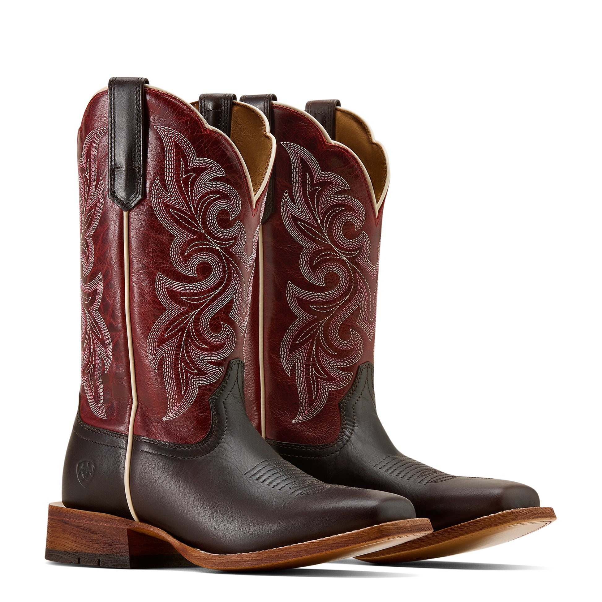 Pair of brown and red ariat cowboy boots with intricate designs on a white background