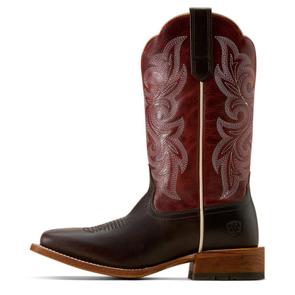 Brown and red ariat cowboy boot with intricate embossing on a white background