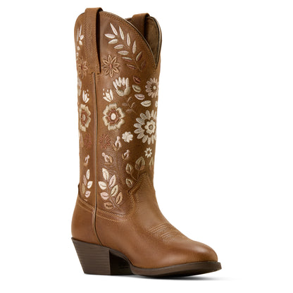 Brown ariat cowboy boot with floral embroidery on a white background