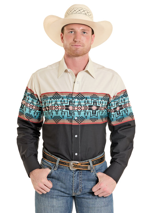 Man wearing a cowboy hat, Panhandle Slim aztec patterned western shirt, and jeans on a white background