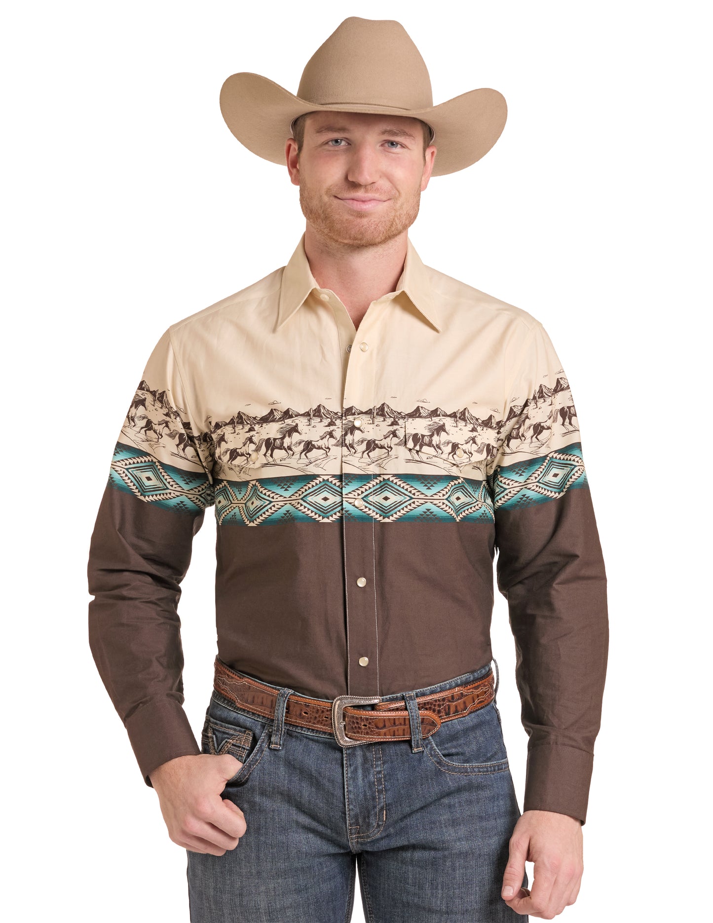 A man wearing a long-sleeve western button-up Panhandle Slim shirt with a beige and brown color-blocked design, featuring a horse pattern across the chest and teal geometric accents. He is also wearing a tan cowboy hat, a brown leather belt, and blue jeans against a plain white background.