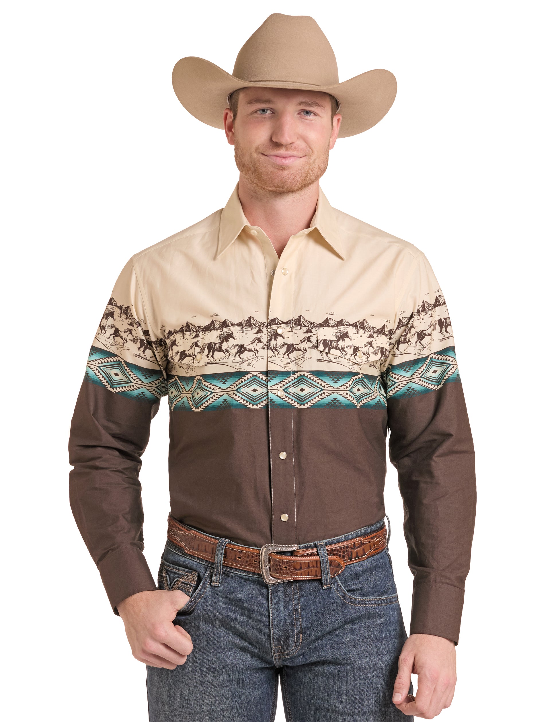A man wearing a long-sleeve western button-up Panhandle Slim shirt with a beige and brown color-blocked design, featuring a horse pattern across the chest and teal geometric accents. He is also wearing a tan cowboy hat, a brown leather belt, and blue jeans against a plain white background.