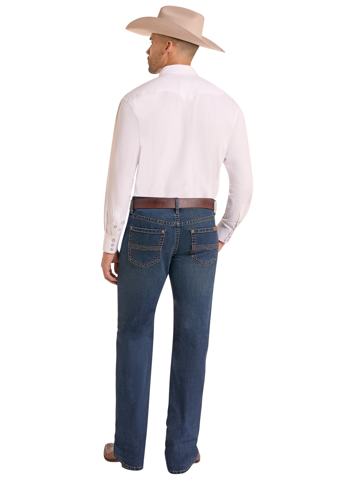 A man shown from the back wearing a light pink long-sleeve button-down shirt, blue jeans, a brown belt, and a beige cowboy hat, against a plain white background.