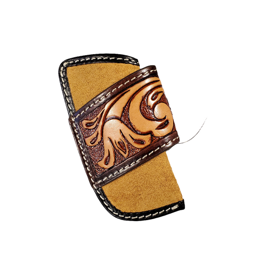 Leather knife sheath with embossed design on a white background