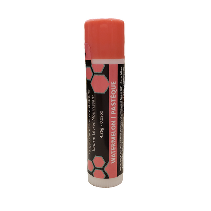 pink lip balm tube on a white background