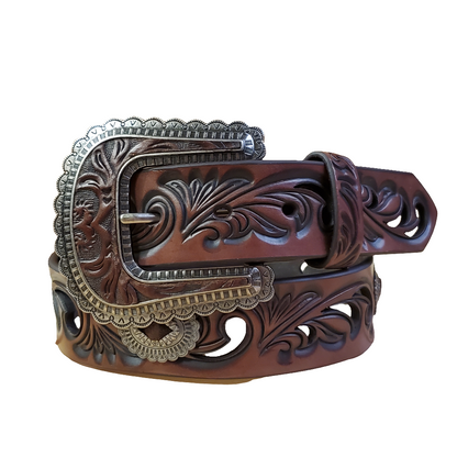 A brown leather women's belt with Southwest cutouts and a metal buckle with cutouts and conchos.