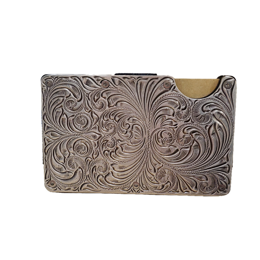 A western utility wallet with antique scrolling engraving detail.