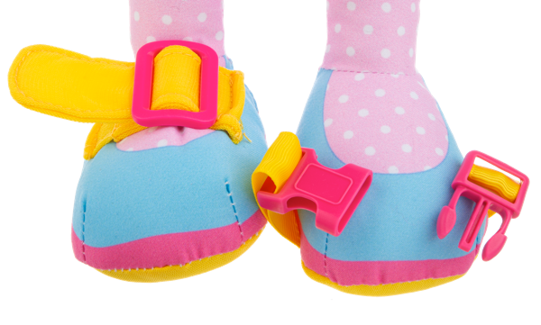 Colorful Ganz baby booties with polka dot design on a stuffed doll on a white background