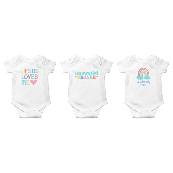 Three Ganz white baby onesies with colorful text and graphics on a white background