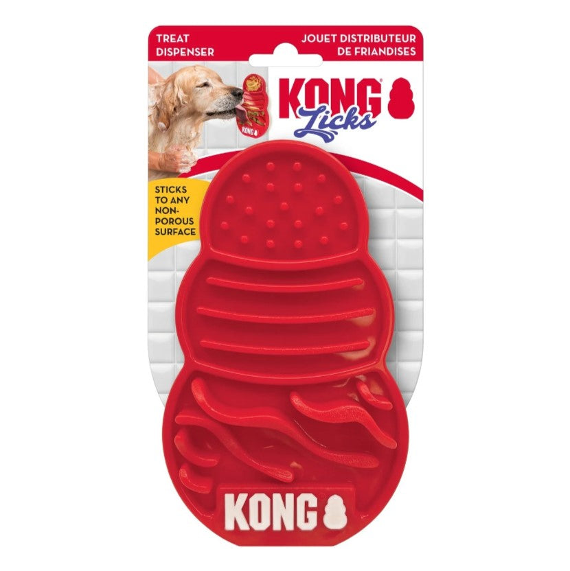 a red kong licking toy with packaging that suggests it is for dogs and should stick to things