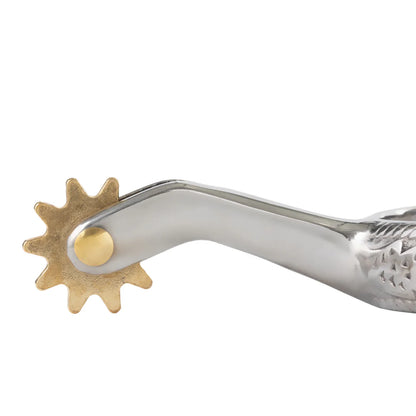 close up of gold colored spur rowel with silver colored spur shank on a white background 