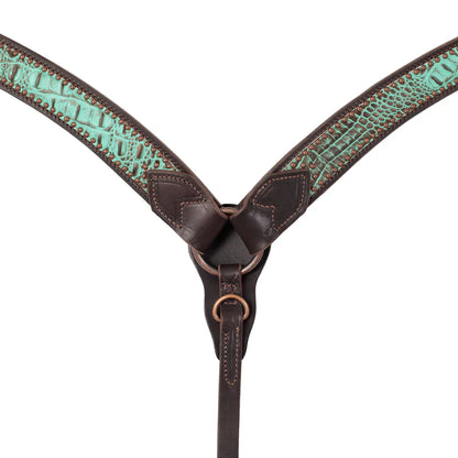 Brown leather breast collar with turquoise croc patterned on a white background