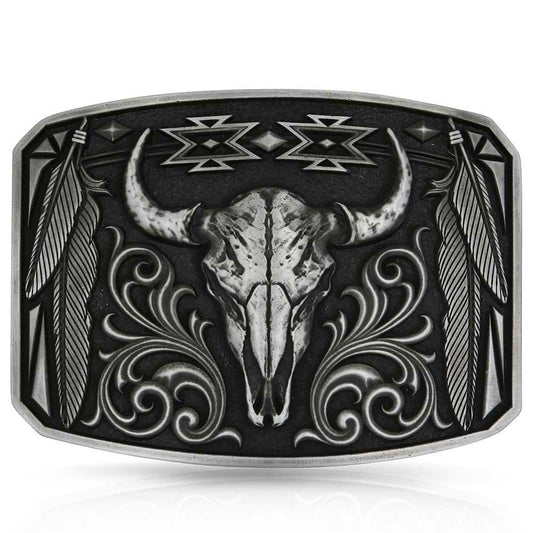 Bull skull Montana Silversmiths belt buckle with decorative patterns on a white background