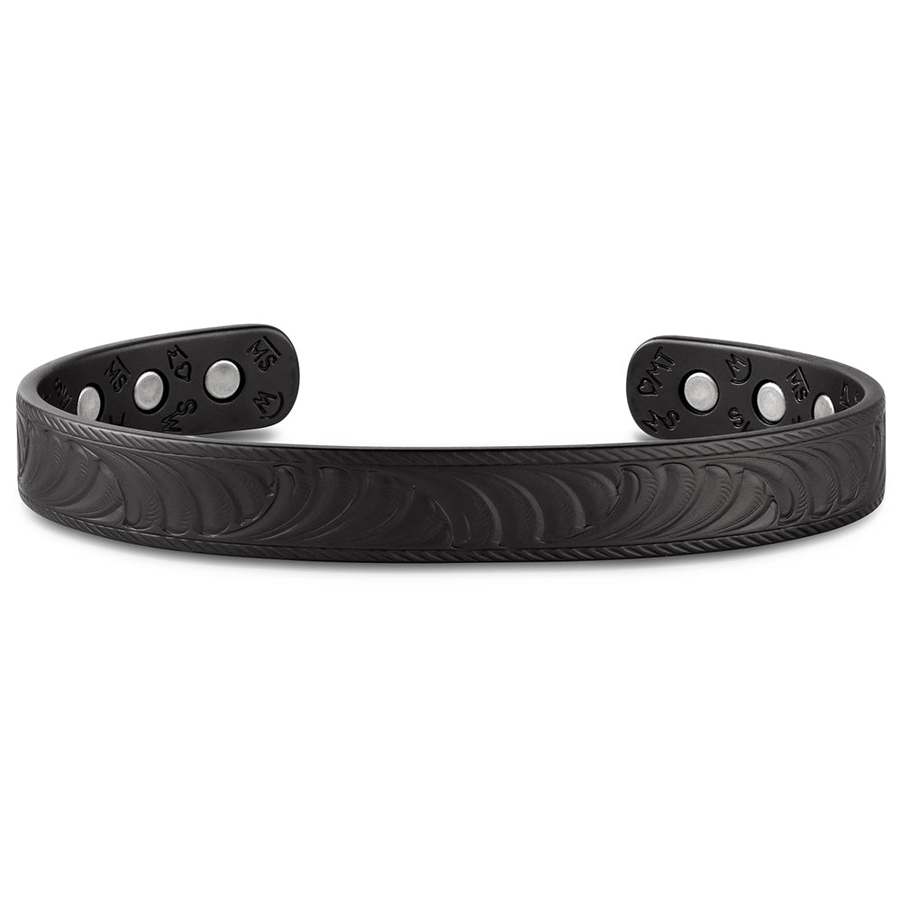 Black Montana Silversmiths bracelet with engraved design on a white background