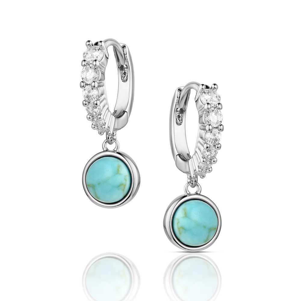 Silver hoop Montana Silversmiths earrings with turquoise stones on a white background