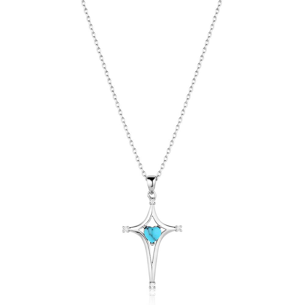 Silver Montana Silversmiths necklace with a star-shaped pendant featuring a blue gemstone on a white background