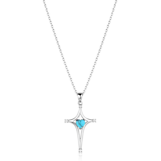 Silver Montana Silversmiths necklace with a star-shaped pendant featuring a blue gemstone on a white background