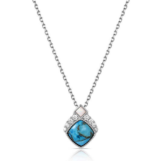 Silver Montana Silversmiths necklace with a turquoise gem on a white background