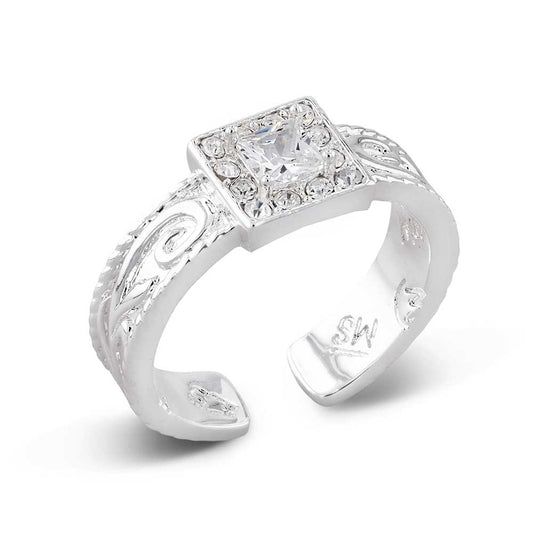 Silver Montana Silversmiths ring with a large diamond and intricate design on a white background