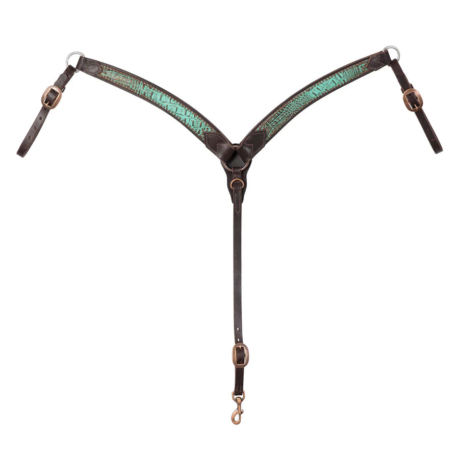Horse breast collar with turquoise croc pattern on a white background